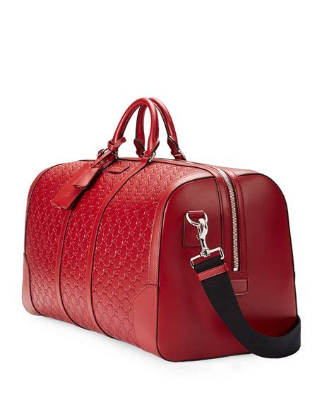 gucci signature leather duffle red|Gucci suede duffle bag.